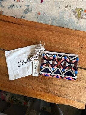 Cleobella Multicolor Tassel Zip Clutch